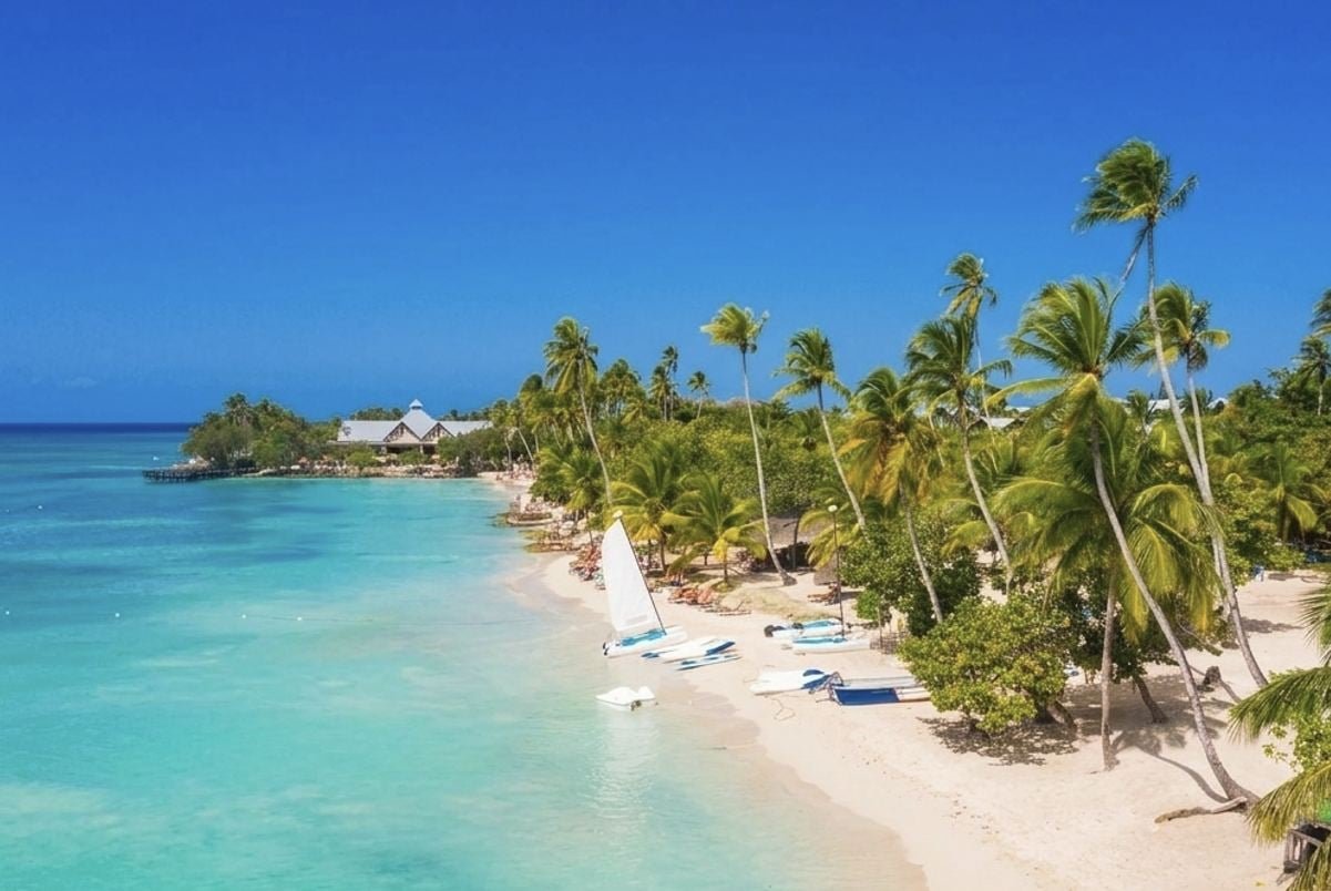 This Seaweed-Free Caribbean Destination With Ancient Cenotes, 82°F Winters, And $12 Fresh Lobster Is Breaking Tourism Records