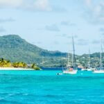 Turquoise sea and anchored yachts near Carriacou island, Grenada, Caribbean sea